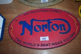A reproduction Norton plaque.