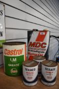 A selection of collectable vintage tins, including three unopened tins of Texaco Havoline motor