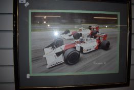 A framed and glazed print, 'Dynamic Duel', Alain Prost and Ayrton Senna, 1988 Marlboro Mclaren MP44,