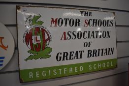 A vintage enamel sign, 'The Motor schools association of Great Britain, registered school.