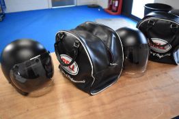 Two classic Bell motorcycle helmets with carry bags, FOR DISPLAY PURPOSES ONLY.