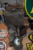 A vintage Shell jerry can and a Pratts jerry can, a blow torch and jugs.