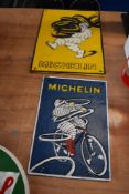 Two reproduction Michelin plaques.