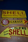 Three reproduction Shell plaques.