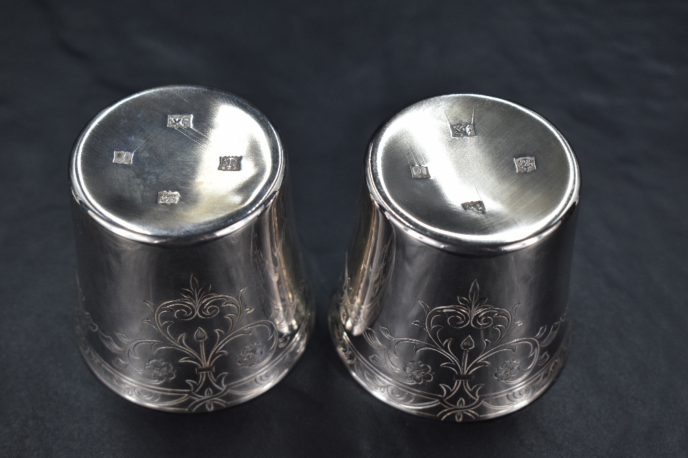 A pair of cased Queen Elizabeth II silver beakers or cups, of flared cylindrical form with - Image 3 of 3