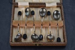 A cased set of six Queen Elizabeth II silver coffee bean spoons, of traditional form with marks