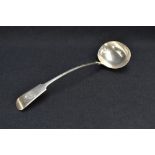 A late Victorian silver fiddle pattern ladle, engraved with Demi lion crest, marks for Sheffield