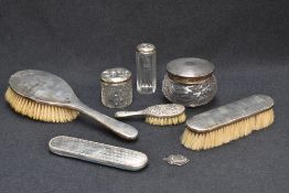 A selection of mixed silver mounted dressing table items, to include powder jar, dressing table