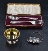 A Queen Elizabeth II silver christening set, comprising Sandringham pattern spoon and fork with bell