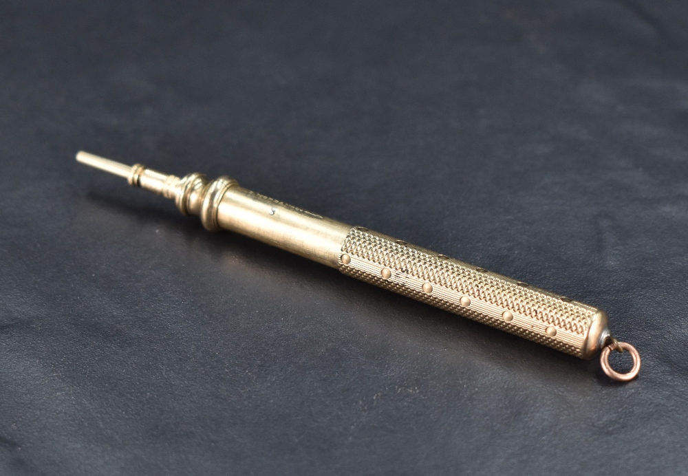 A Sampson & Mordan & Co gilt metal propelling pencil with engine-turned body and push/pull action, - Image 2 of 3