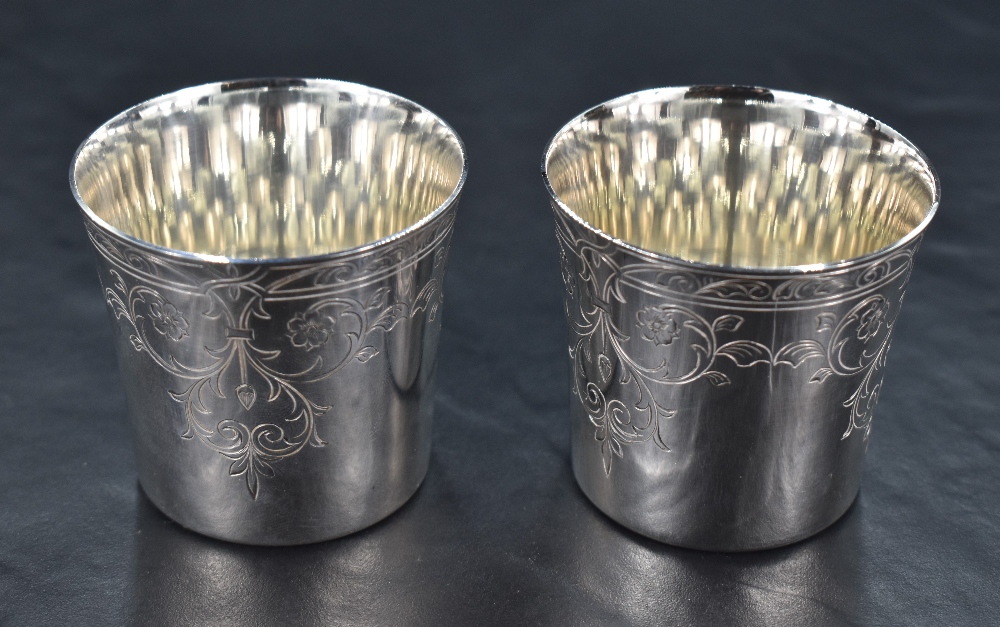 A pair of cased Queen Elizabeth II silver beakers or cups, of flared cylindrical form with - Image 2 of 3