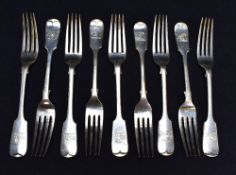 A harlequin group of nine fiddle pattern table forks, each engraved with demi lion crest and with