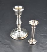 A Queen Elizabeth II silver candlestick, of traditional form with moulded ring detail, marks for