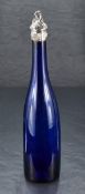 A 19th century Bristol blue glass bottle decanter, of slender form with cast-white metal mount and