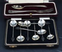 A harlequin set of eight George V silver coffee bean spoons, of traditional design, marks for