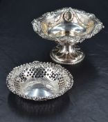 A late Victorian silver pedestal dish, of circular form embossed with roundals and bell flower