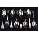 A harlequin set of seven /VictorianEdwardian silver fiddle pattern table spoons, engraved with