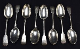 A harlequin set of seven /VictorianEdwardian silver fiddle pattern table spoons, engraved with