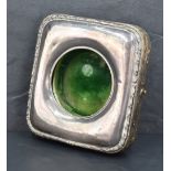 An Edwardian silver mounted picket watch holder, of hinged square form with rounded corners