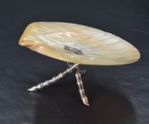 A late 19th century Chinese white metal and mother-of-pearl dish, the dish with central butterfly