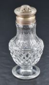 A George V silver topped and mounted cut-glass sugar sifter, the associated pierced pull-off cover
