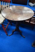 A 19th Century mahogany occasional pedestal table