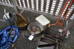 A vintage push mower, watering can, jam pans etc