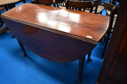 A late 19th or early 20th Century mahogany gateleg table having oval top and cabriole legs
