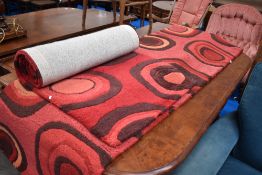 Two modern rugs in a vintage style, each approx 230 x 60cm