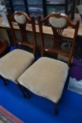 Two Victoria stained frame dining chairs having later beige dralon upholstery