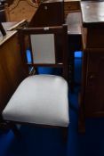 A reproduction upholstered salon or bedroom chair in the Victorian style