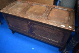 A traditional oak Jacobean style bedding box, width approx. 107cm