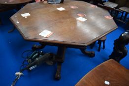 A Victorian oak dining table having octagonal top on quatrefoil base, bought from the clearance sale