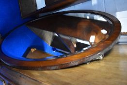 An early 20th Century mahogany frame oval wall mirror