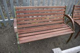 A cast iron framed railway or park style bench (one of three) approx 130cm
