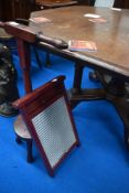A traditional washboard and wooden dolly