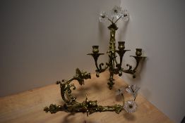 A pair of 19th/20th Century gilt metal three branch wall sconces, measuring 45cm tall