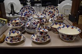 A collection of 19th Century hand painted tableware, of oriental design, and including a teapot,