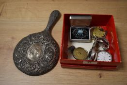 A selection of pocket watch and watch parts, a brooch and an embossed mirror handle in silver tone