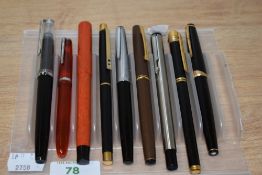 Nine fountain pens including Pelikan, Papermate, Waterman etc