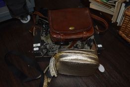 A collection of high quality ladies handbags, including tan leather 'The Bridge' bag, Fiorelli and