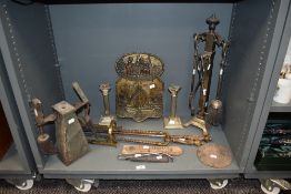 An assorted collection of metalware, to include two fireside companion stands, white metal candle