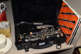 An Artley clarinet and a selection of books.