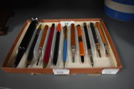 Nine large lead or crayon propelling pencils in various forms