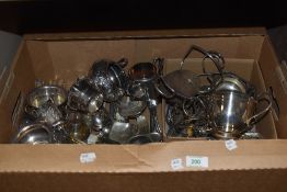 A box of miscellaneous silver plated ware, to include cased carving sets, embossed metalware, and