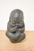 A Chinese cast bronze baby Buddha.