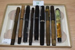 Nine fountain pens including Waterman, Conway Stewart, Grapevine (dipping pen), Esterbrook, Sheaffer