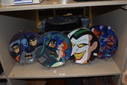A collection of 1990s Warner Bros. DC themed collector's plates, including Batman and Robin & The