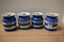 Four T G Green Cornish wear storage jars; Castor sugar, Pearl barley, Cornflour and Cocoa.