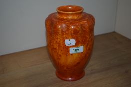 A Pilkington's Royal Lancastrian vase, shape 2368, glazed in orange, and measuring 21cm tall